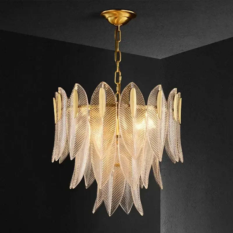 Luxury decorbites glass leaf gold chandelier featuring textured clear glass leaves and brass chain for living room lighting