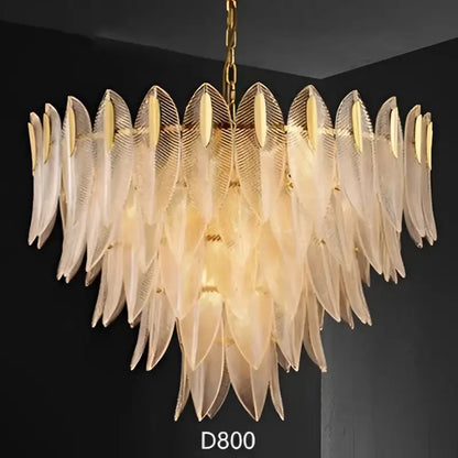 A luxury chandelier with translucent layered glass leaf petals in gold by decorbites for living room pendant light