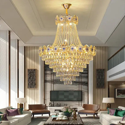 Luxury decorbites gold round chandelier with intricate tiered design and blue crystal stair accent stones