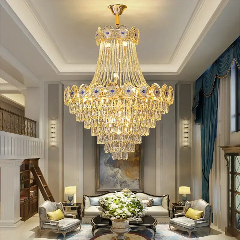 Luxury decorbites gold round chandelier with cascading tiers and blue crystal gemstone accents for stair lighting