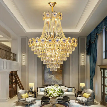 Luxury decorbites gold round chandelier with cascading tiers and blue crystal gemstone accents for stair lighting