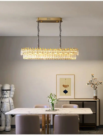 Luxury gold and blue crystal ceiling chandelier with gold-toned rectangular frame and dangling crystal prisms decorbites crystal ceiling