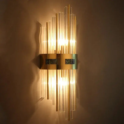 Luxury gold and blue crystal led wall lamp with gold-toned sconce and dark green marble for dining room decorbites crystal led