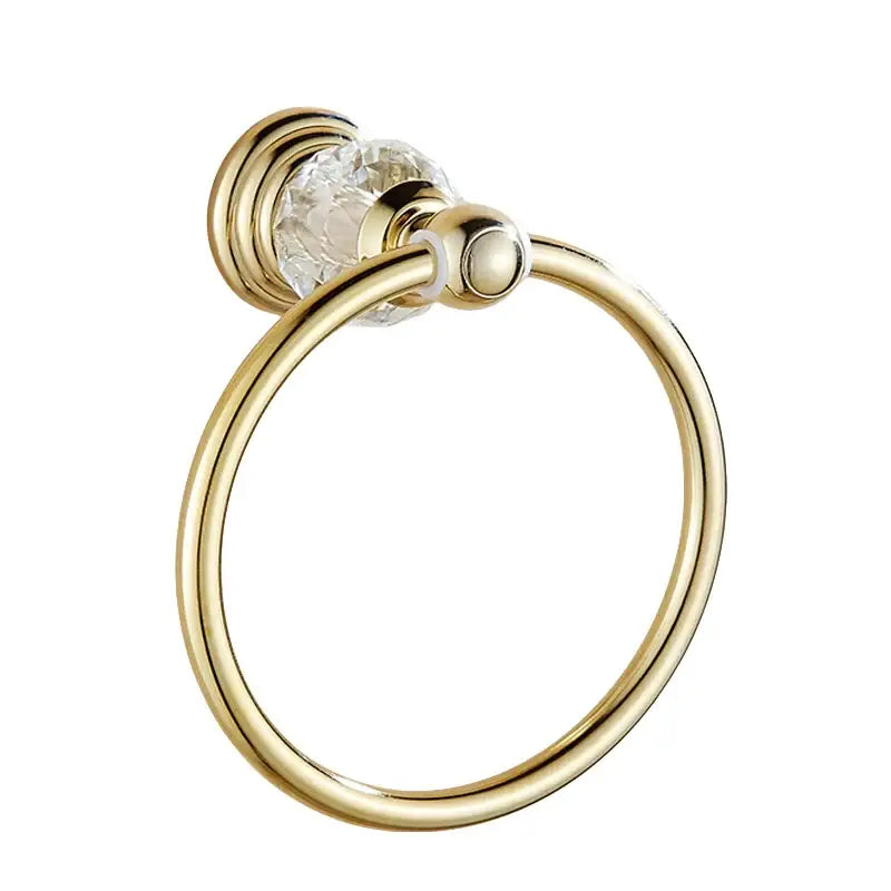 Gold-toned bathroom towel ring with faceted crystal accent in luxury gold and crystal bath hardware set