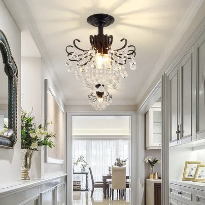 Black wrought iron pendant light with dangling clear crystal droplets luxury gold black crystal decorbites dining room chandelier