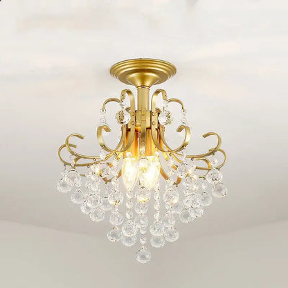 Luxury gold black crystal pendant light chandelier with intricate curved arms and cascading clear droplets for dining room decorbites gold black