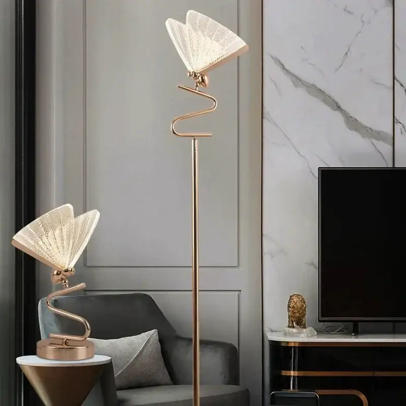Gold-toned decorbites butterfly floor lamp with translucent fan-shaped shade and curved metallic base for living room lighting