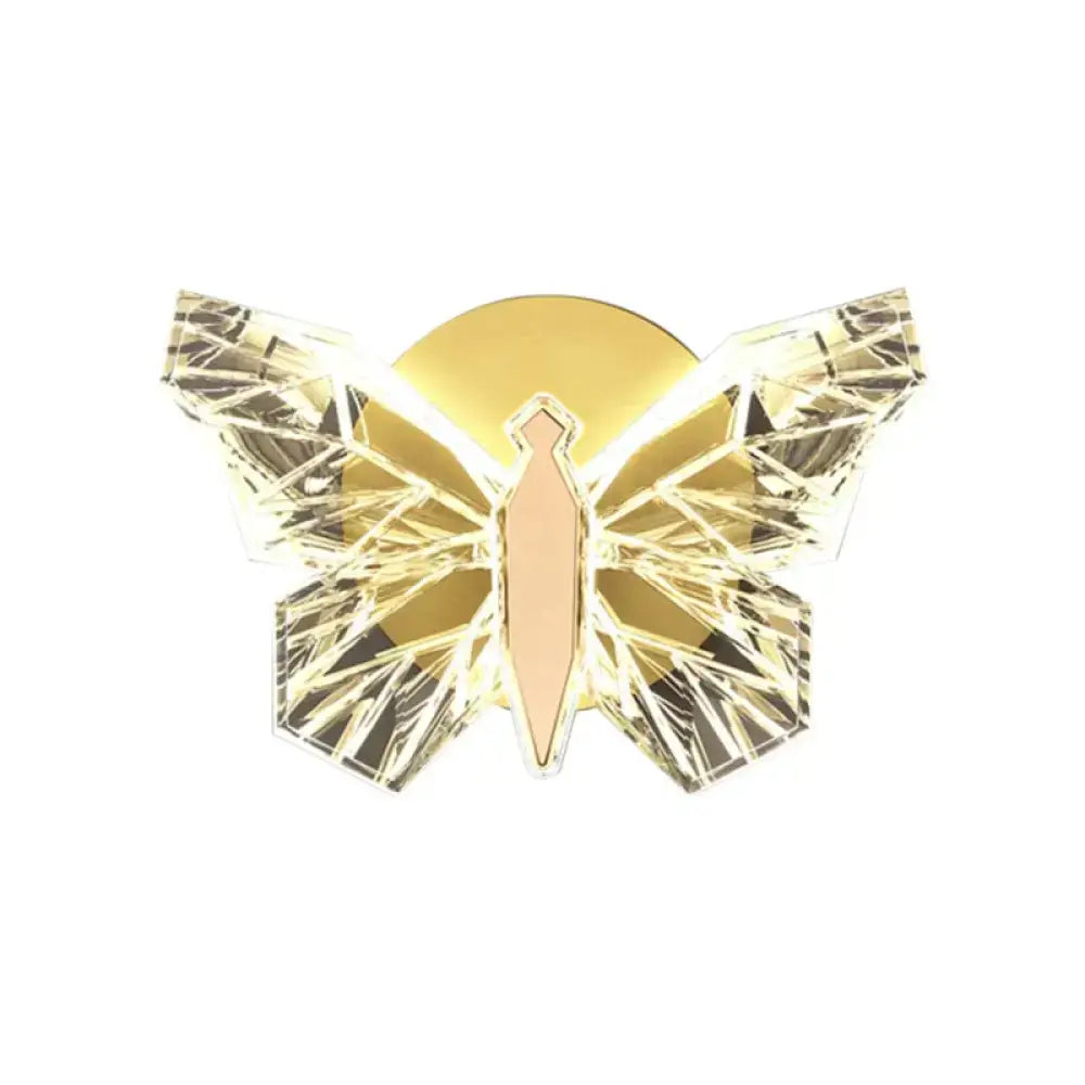 Luxury gold butterfly wall lamp with geometric faceted wings and central tie motif for bedroom lighting