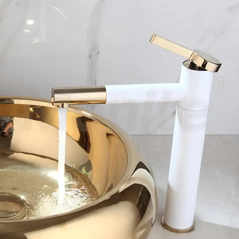 Modern white and gold ceramic bath mixer set with a sleek minimalist design for luxury vessel sink and bathroom use