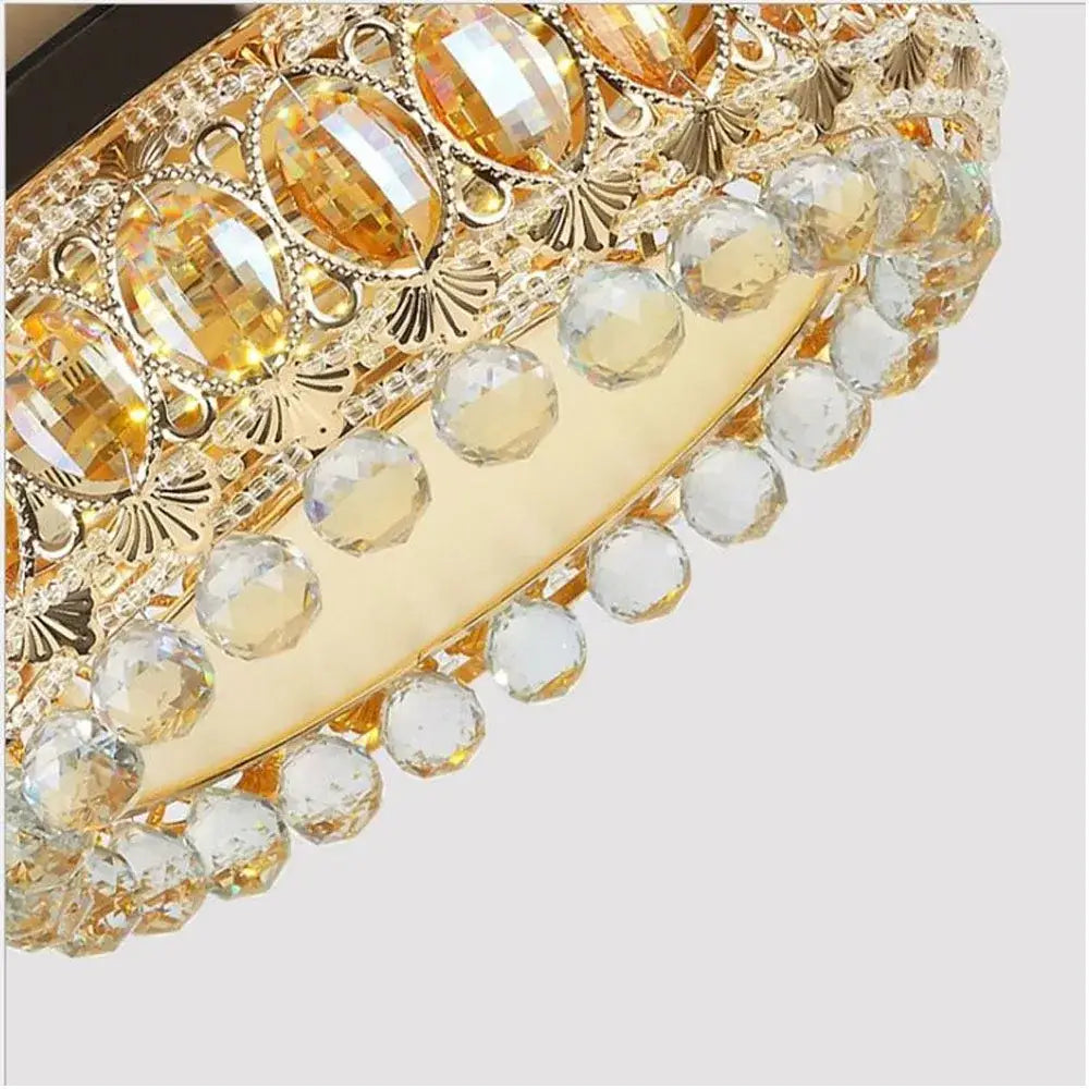 Luxury gold crystal ceiling fan light with faceted amber and clear crystal beads for elegant living room decor