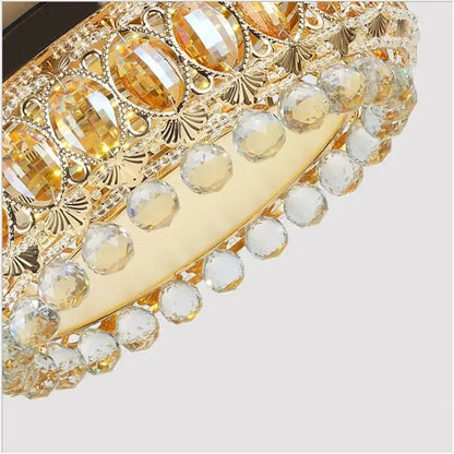 Luxury gold crystal ceiling fan light with faceted amber and clear crystal beads for elegant living room decor