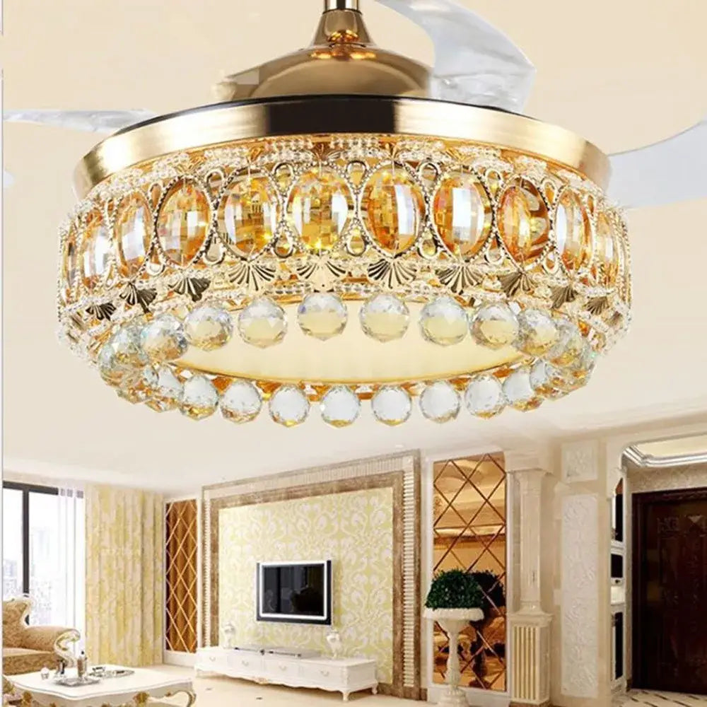 Luxury gold crystal ceiling fan light with amber oval crystals and clear dangling beads for living room use