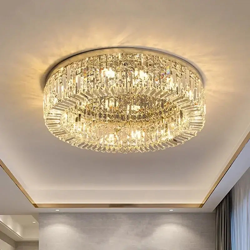 Luxury gold crystal glass round ceiling light with faceted decorbites crystal glass tiers emitting warm light