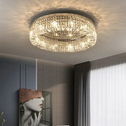 Luxury gold crystal glass round ceiling light with multiple tiers of decorbites crystal glass emitting warm light