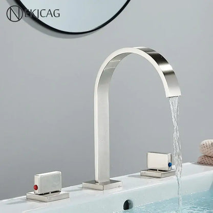 Modern brushed nickel basin faucet with sleek arched spout and rectangular handles, decorbites crystal handle gold accents