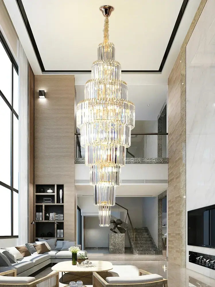 Luxury gold crystal pendant chandelier with cascading clear faceted crystals by decorbites for hotel lobby decor