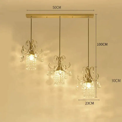 Gold-toned decorbites luxury single head pendant light with crystal droplets and ornate metalwork for dining room use