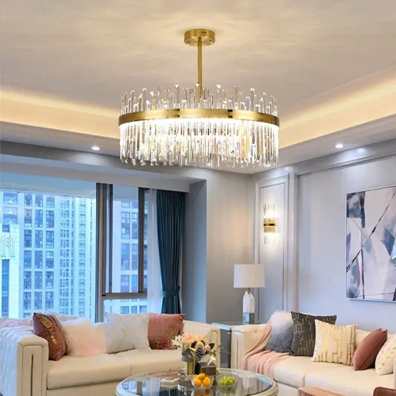 Luxury gold decorbites crystal chandeliers with cascading crystal prisms for elegant dining room lighting