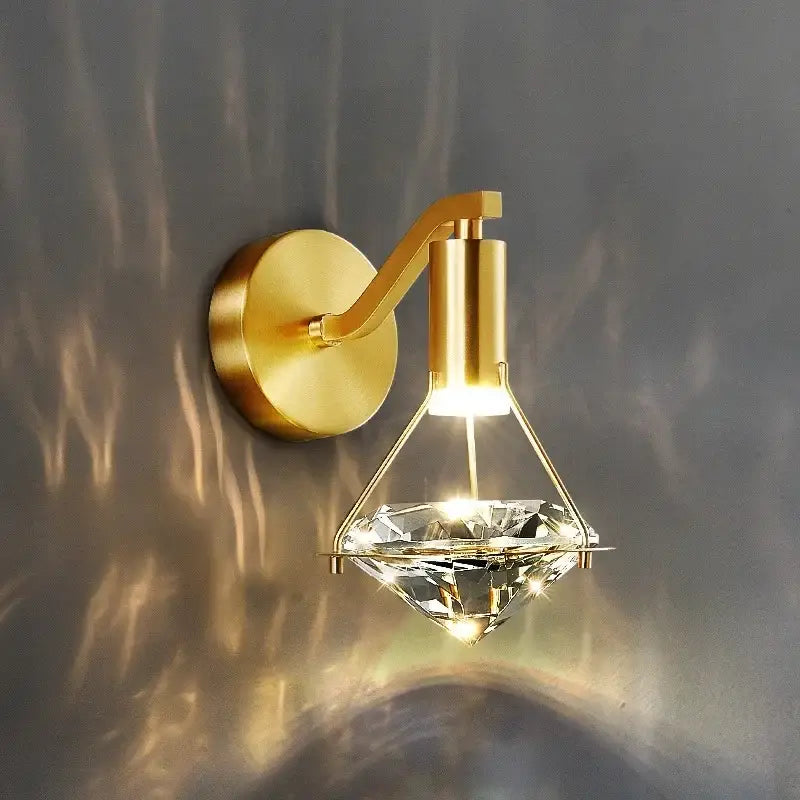 Luxury gold wall lamp featuring a diamond crystal pendant suitable for elegant living room decoration