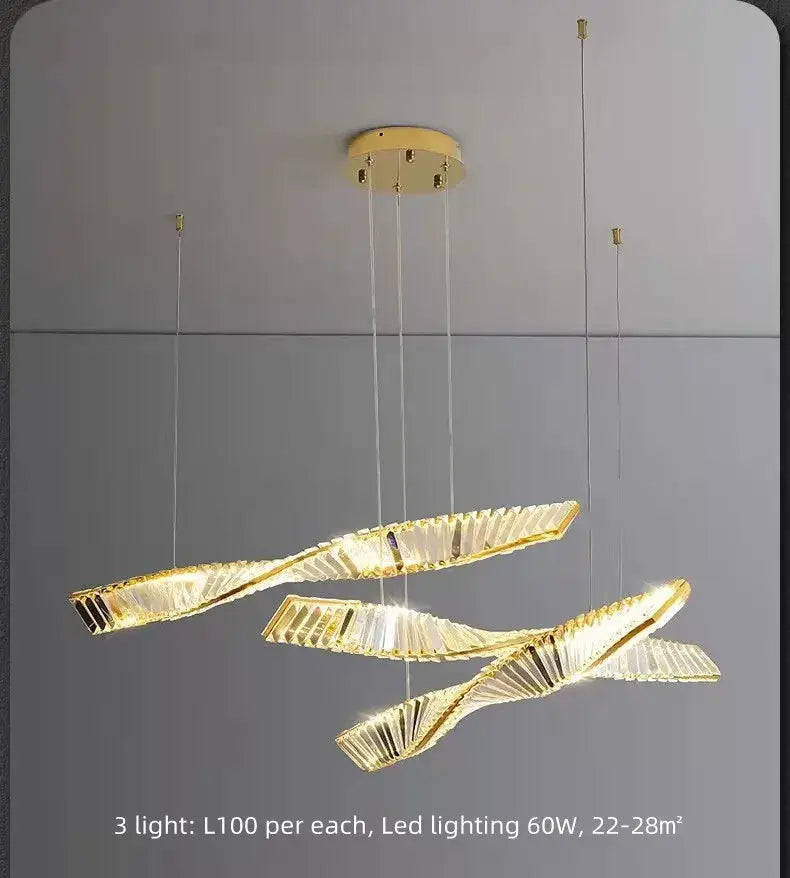 Luxury gold dimmable crystal wall sconce with three twisted crystal-encrusted arms for elegant living room decorbites dimmable crystal lighting
