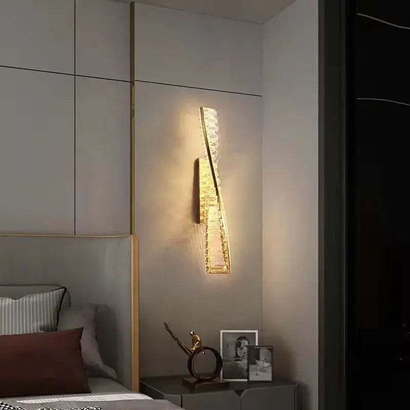 Luxury gold dimmable crystal wall sconce with embedded crystals creates warm glowing light for living room decorbites dimmable crystal