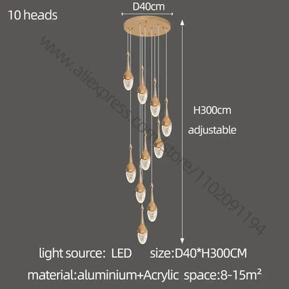 Luxury gold led staircase chandelier with ten crystal teardrop light heads suspended from aluminum mount by decorbites gold led