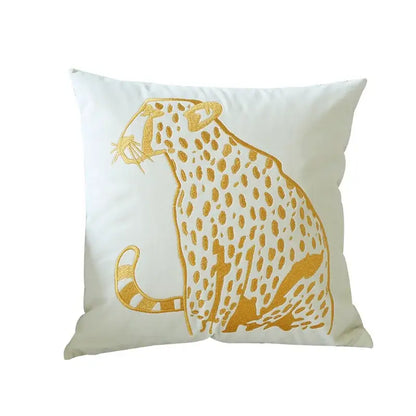 White throw pillow case with embroidered gold leopard design in gold leopard velvet for decorbites living room decor
