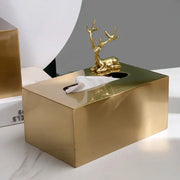 Luxury gold metal tissue box with a polished finish and ornamental golden deer figurine for living room storage