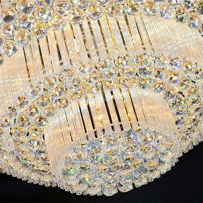 Luxury gold multi-tiered crystal led chandelier with cascading faceted crystals and metal accents for living room