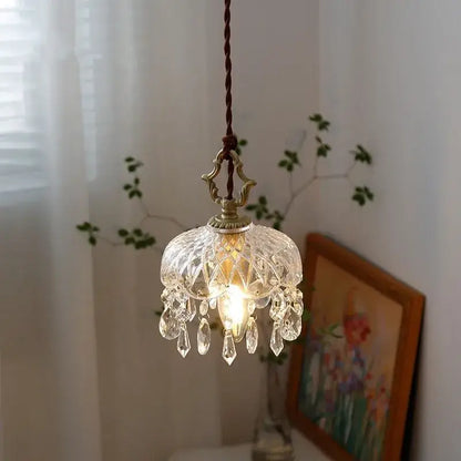 Luxury gold twisted cord wall sconce with delicately hanging decorbites crystal glass shade and teardrop crystals