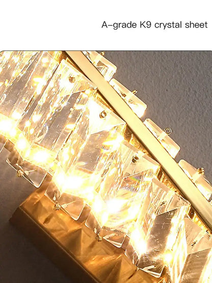 Luxury golden twisted crystal led wall sconce with a-grade k9 crystal sheets and warm golden lighting for elegant decorbites crystal led decor