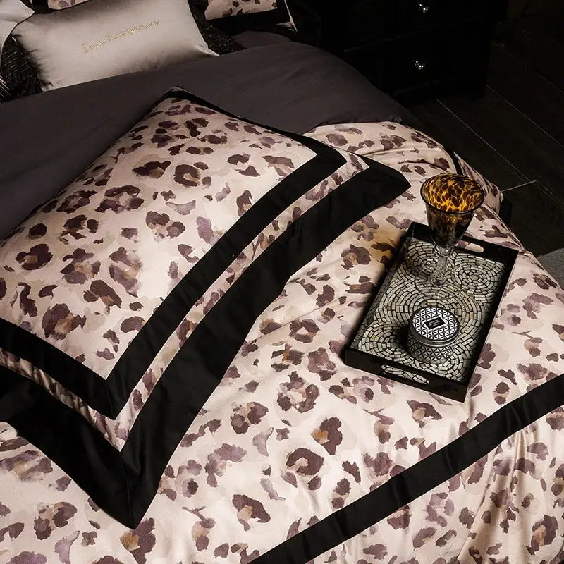 Luxury leopard print satin pillowcase with bold black piping from decorbites bedding set in cream and black colors