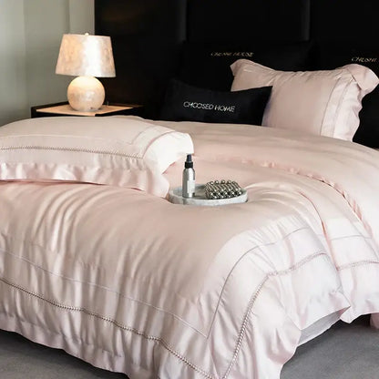 Pink satin bedding set with subtle beaded trim in decorbites light champagne luxury egyptian cotton embroidery