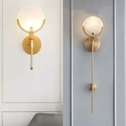 Luxury marble and copper wall lamp with gold-toned sconce, frosted glass globe, and decorbites marble accent for bedroom decor