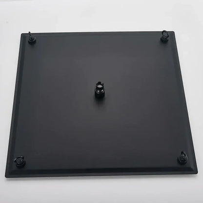 Luxury matte black glass display stand with four hooks and central post showcasing rainfall shower head for enhanced shower experience