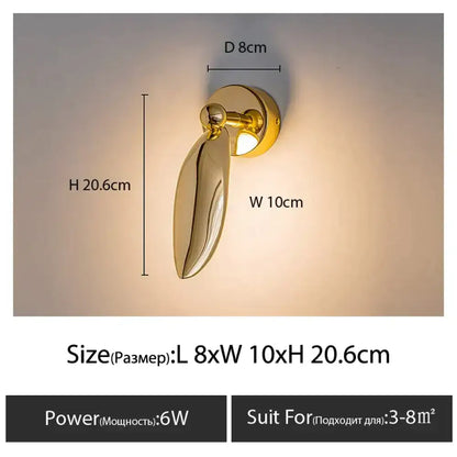 Luxury minimalist creative gold-colored seagull wall lamp with polished metallic finish and teardrop shade for bedroom