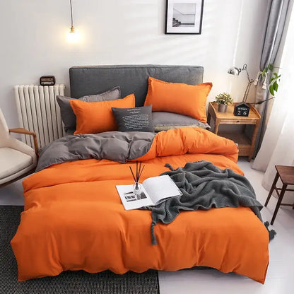 Luxury orange and gray duvet cover set includes matching pillowcases and throw blanket for stylish bedroom bedding