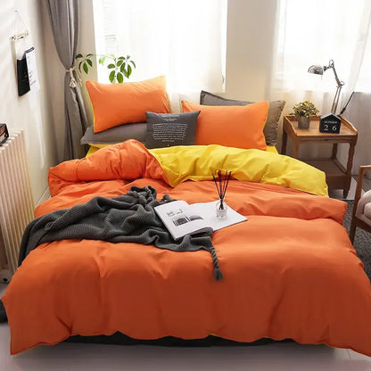 Luxury orange and gray duvet cover set featuring vibrant colors and a textured knit throw blanket for bedroom bedding