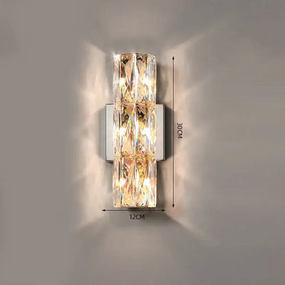 Luxury silver crystal wall sconce with faceted crystal segments and polished chrome base for living room decorbites crystal deluxe