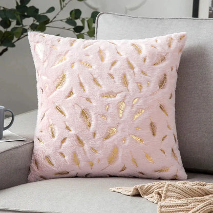 A soft pink plush luxury cushion cover with gold feather patterns for decorbites golden fur bedroom decor