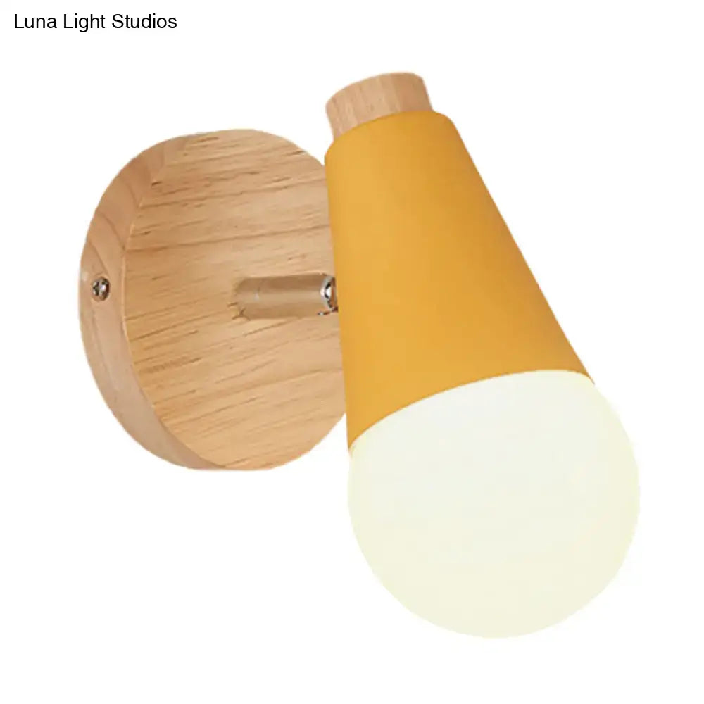 A macaron loft sweet cone pink wall sconce with metal wood base and mustard-yellow tapered shade for corridor lighting