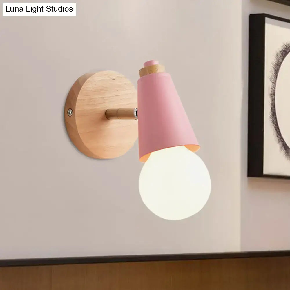 Macaron loft sweet cone pink wall sconce with metal wood base featuring a glowing bulb for corridor lighting