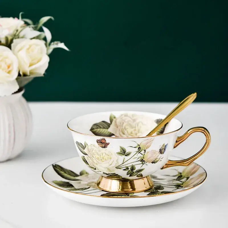 Elegant white bone china tea cup set with gold trim and magnolia floral decorbites bone china design