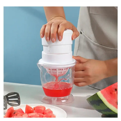 Manual white plastic fruit juice extractor with clear glass base and heart-shaped cutout for decorbites fruit juice use