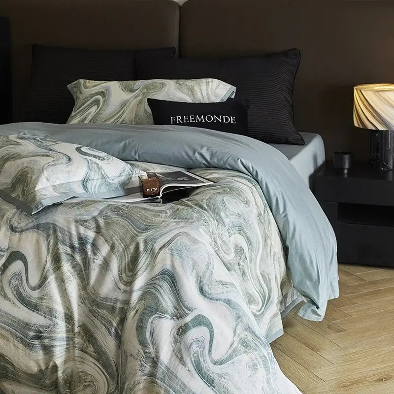 The marble gray and teal bedding set features a flowing abstract marble pattern in 100s egyptian cotton by decorbites