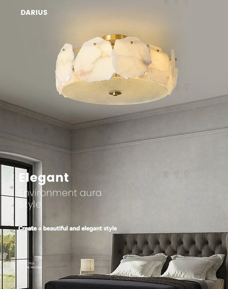 A darius brand marble led chandelier round pendant light with translucent white marble petals and brass base