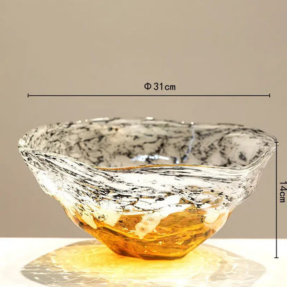 A translucent marbled white and black glass bowl with an amber base, ideal as a black glass vase decorbites gradients black piece
