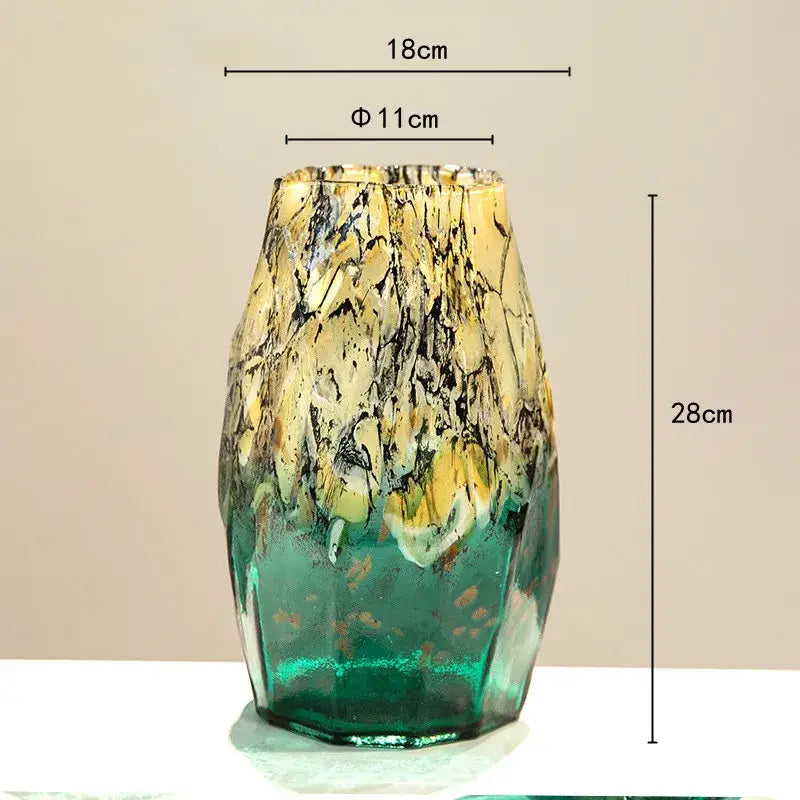 A tall black glass vase with marbled green and golden-yellow gradients perfect for living room decorbites