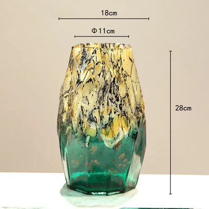 A tall black glass vase with marbled green and golden-yellow gradients perfect for living room decorbites