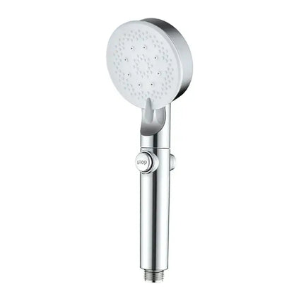 Silver handheld shower head with white spray face and textured nozzles for a decorbites adjustable shower experience